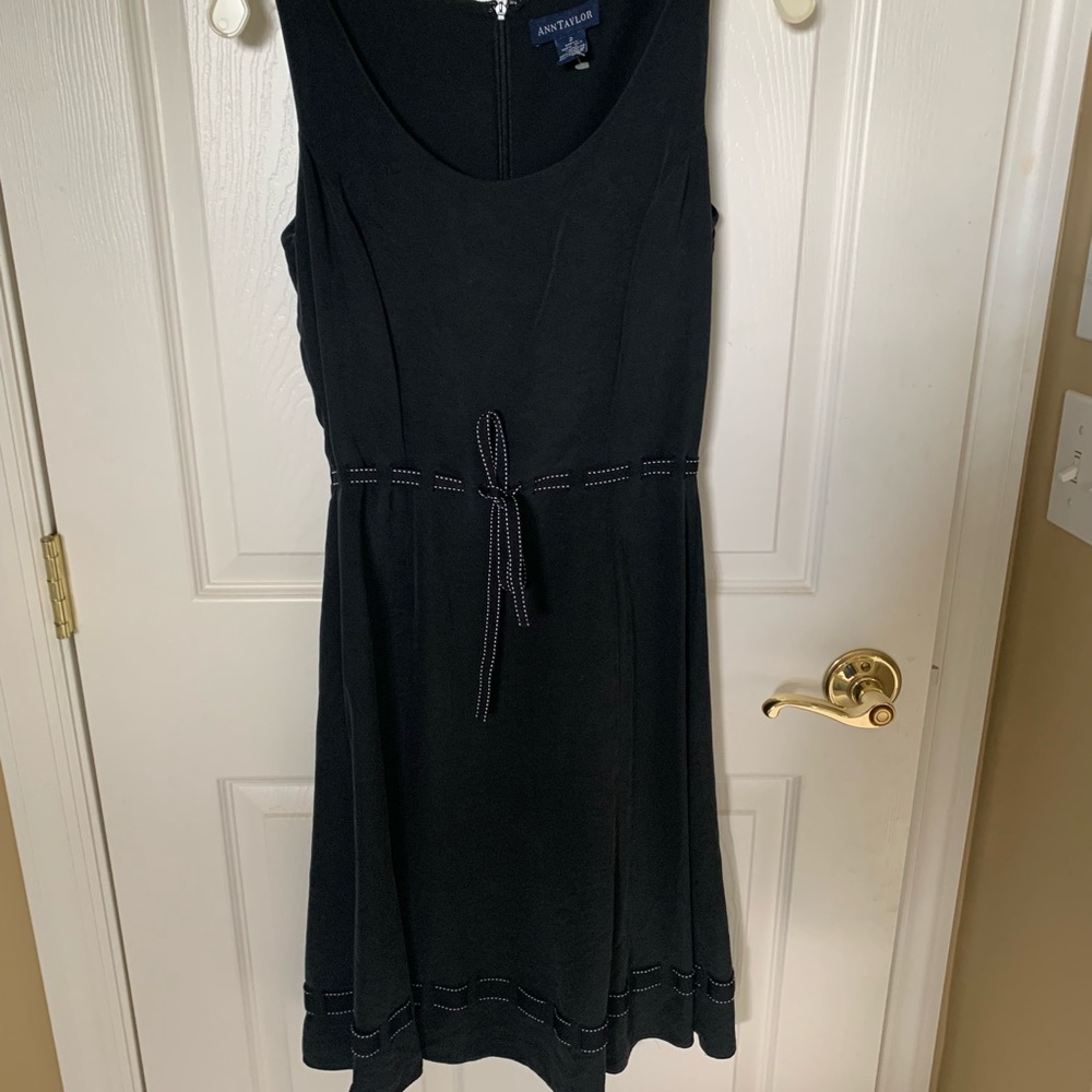 Black Dress with black and white tie around waist